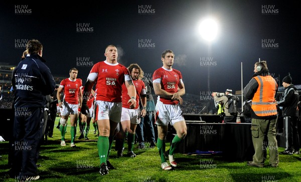 19.06.10 - New Zealand v Wales - 2010 Steinlager Series - Andrew Bishop of Wales leaves the field holding his hand after taking a knock. 