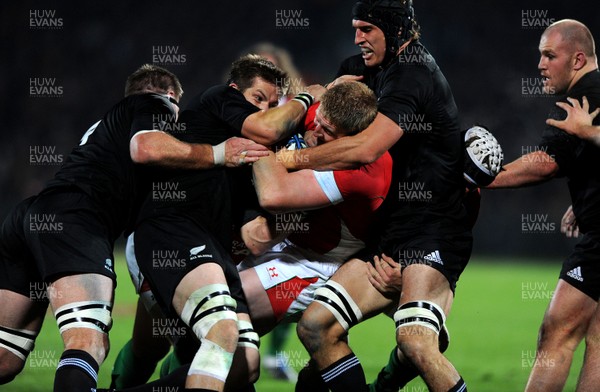 19.06.10 - New Zealand v Wales - 2010 Steinlager Series - Bradley Davies of Wales is stopped. 