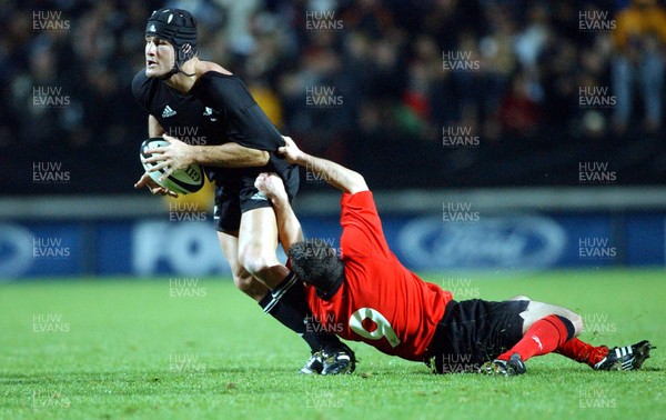 210603 - New Zealand v Wales - Wales Tour of Australasia - All Blacks' Marty Holah gets past Wales' Gareth Cooper