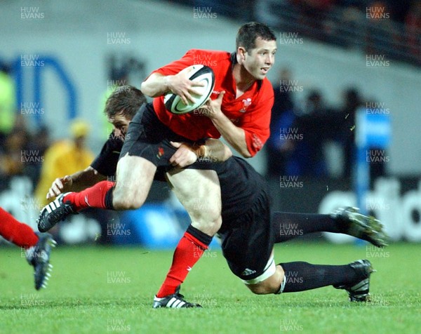 210603 - New Zealand v Wales - Wales Tour of Australasia - All Blacks captain Reuben Thorne gets a hold of Gareth Cooper