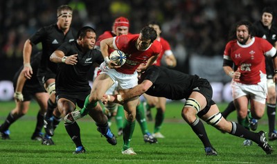 26.06.10 - New Zealand v Wales - 2010 Steinlager Series - Jamie Roberts of Wales tries to get through the All Blacks defence. 