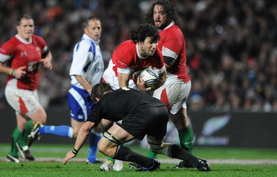 26.06.10 - New Zealand v Wales - 2010 Steinlager Series - Mike Phillips of Wales takes on Richie McCaw of New Zealand 