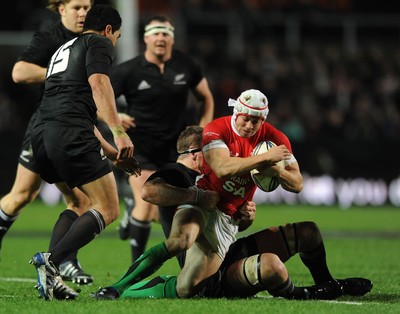 26.06.10 - New Zealand v Wales - 2010 Steinlager Series - Leigh Halfpenny of Wales is stopped. 
