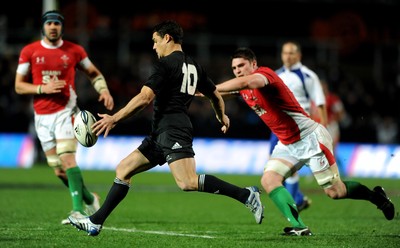 26.06.10 - New Zealand v Wales - 2010 Steinlager Series - Rob McCusker of Wales tackles Dan Carter of New Zealand. 