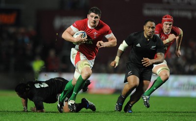 26.06.10 - New Zealand v Wales - 2010 Steinlager Series - Rob McCusker of Wales gets away from Kevin Mealamu of New Zealand. 