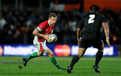 26.06.10 - New Zealand v Wales - 2010 Steinlager Series - Dan Biggar of Wales takes on Kevin Mealamu of New Zealand. 