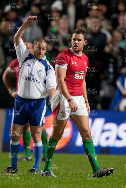 26.06.10  New Zealand v Wales... Referee Jonathan Kaplan indicates the dangerous tackle that sees Wales fullback Lee Byrne sent off just before half time 