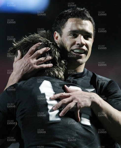 26.06.10  New Zealand v Wales... All Black Dan Carter congratulates teammate Cory Jane after scoring a try. 