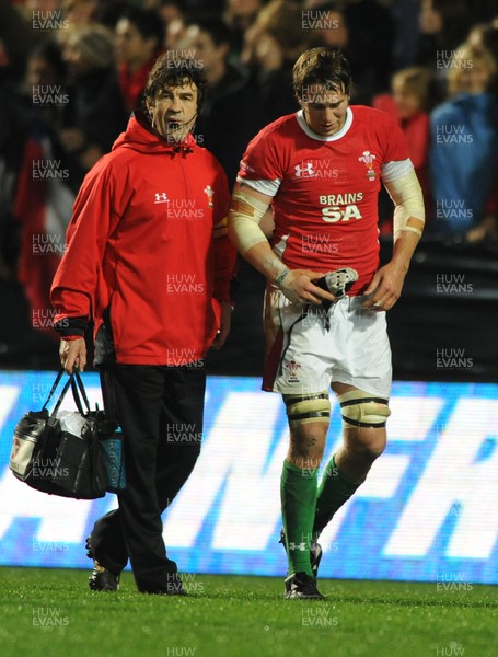 26.06.10 - New Zealand v Wales - 2010 Steinlager Series - Ryan Jones of Wales is helped off by physio Mark Davies. 