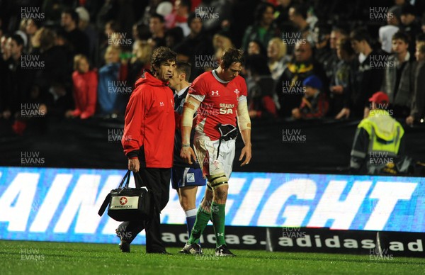 26.06.10 - New Zealand v Wales - 2010 Steinlager Series - Ryan Jones of Wales is helped off by physio Mark Davies. 