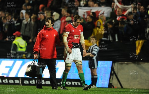 26.06.10 - New Zealand v Wales - 2010 Steinlager Series - Ryan Jones of Wales is helped off by physio Mark Davies. 