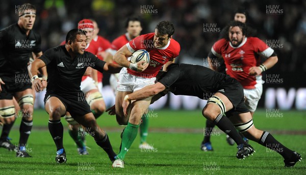 26.06.10 - New Zealand v Wales - 2010 Steinlager Series - Jamie Roberts of Wales tries to get through the All Blacks defence. 