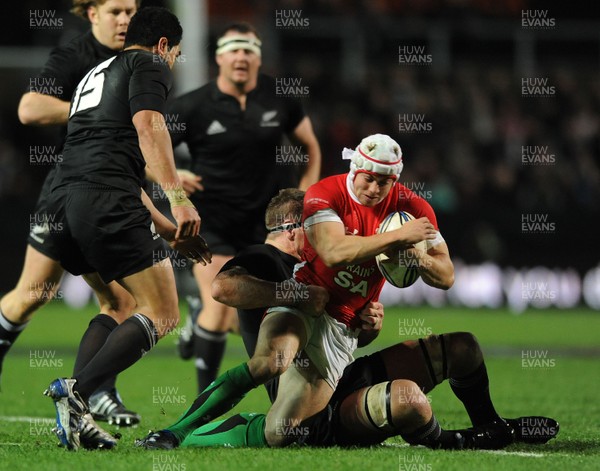 26.06.10 - New Zealand v Wales - 2010 Steinlager Series - Leigh Halfpenny of Wales is stopped. 