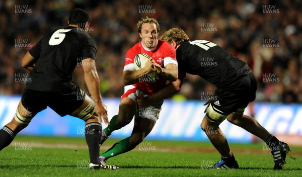 26.06.10 - New Zealand v Wales - 2010 Steinlager Series - Will Harries of Wales is tackled by Adam Thomson of New Zealand. 