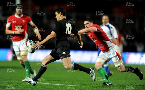 26.06.10 - New Zealand v Wales - 2010 Steinlager Series - Rob McCusker of Wales tackles Dan Carter of New Zealand. 