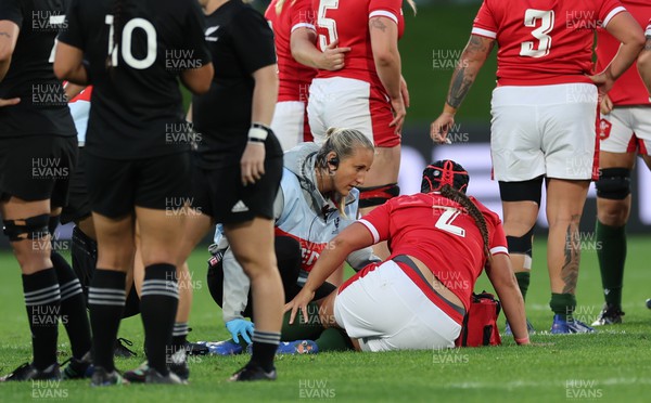 291022 - New Zealand v Wales, Women’s World Cup Quarter-Final - Medic Jo Perkins treats Kelsey Jones of Wales