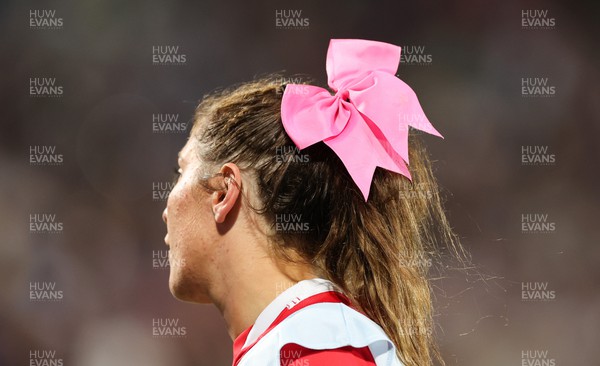 291022 - New Zealand v Wales, Women’s World Cup Quarter-Final - The pink bow in the hair of Georgia Evans of Wales
