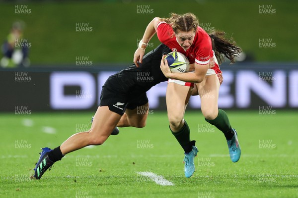 291022 - New Zealand v Wales, Women’s World Cup Quarter-Final - Lisa Neumann of Wales is tackled by Portia Woodman of New Zealand