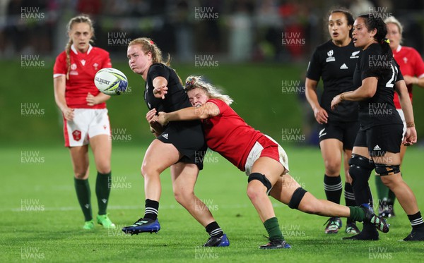291022 - New Zealand v Wales, Women’s World Cup Quarter-Final - Ariana Bayler of New Zealand is tackled by Alex Callender of Wales