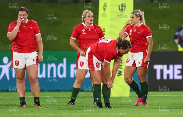 291022 - New Zealand v Wales, Women’s World Cup Quarter-Final - Gwenllian Pyrs, Kelsey Jones, Siwan Lillicrap and Lowri Norkett of Wales react on the final whistle