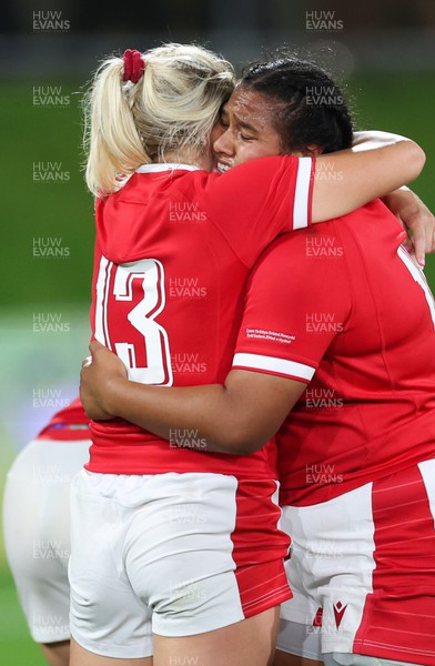291022 - New Zealand v Wales, Women’s World Cup Quarter-Final - Carys Williams-Morris and Sisilia Tuipulotu of Wales react on the final whistle