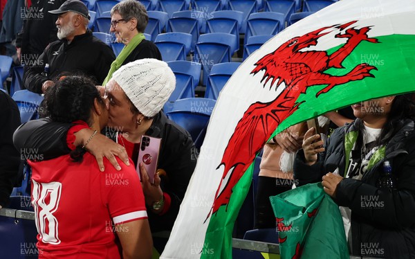 291022 - New Zealand v Wales, Women’s World Cup Quarter-Final - Sisilia Tuipulotu of Wales greets her family at the end of the match