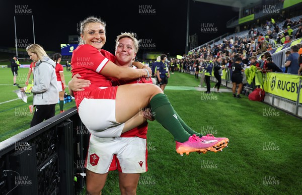 291022 - New Zealand v Wales, Women’s World Cup Quarter-Final - Donna Rose gives Lowri Norkett of Wales a lift at the end of the match