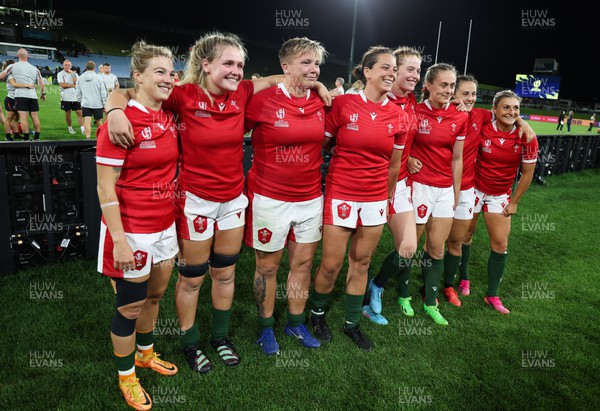 291022 - New Zealand v Wales, Women’s World Cup Quarter-Final - Keira Bevan, Alex Callender, Donna Rose, Sioned Harries, Lisa Neumann, Hannah Jones, Ffion Lewis and Lowri Norkett of Wales pose for photographs at the end of the match