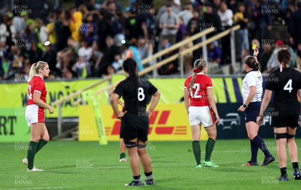 291022 - New Zealand v Wales, Women’s World Cup Quarter-Final -  Referee Aimee Barrett-Theron shows Carys Williams of Wales a yellow card