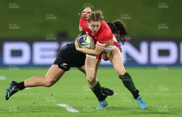 291022 - New Zealand v Wales, Women’s World Cup Quarter-Final -  Lisa Neumann of Wales is tackled by Portia Woodman of New Zealand