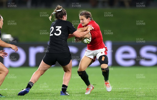 291022 - New Zealand v Wales, Women’s World Cup Quarter-Final -  Jasmine Joyce of Wales is tackled by Renee Holmes of New Zealand