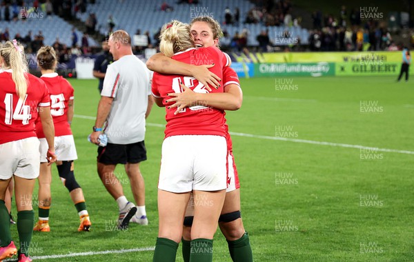 291022 - New Zealand v Wales, Women’s World Cup Quarter-Final -  Carys Williams and Natalia John of Wales at the end of the game