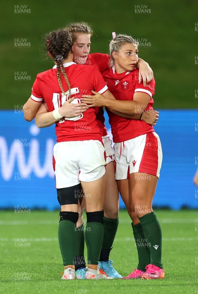 291022 - New Zealand v Wales, Women’s World Cup Quarter-Final -  Jasmine Joyce, Lisa Neumann and Lowri Norkett of Wales at the end of the game