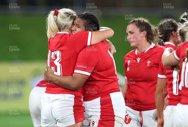291022 - New Zealand v Wales, Women’s World Cup Quarter-Final -  Carys Williams and Sisilia Tuipulotu of Walesat the end of the game