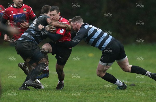 110120 - Newbridge v Brecon, Specsavers National Plate Quarter Final - Lewys Cooke of Brecon tis tackled