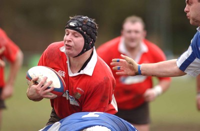 080203 - Newbridge v Bridgend - Principality Cup - Newbridge's Geraint Gladwyn is stopped by Phil Booth