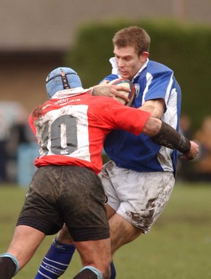 080203 - Newbridge v Bridgend - Principality Cup - Bridgend's Dafydd James is tackled by Jason Williams