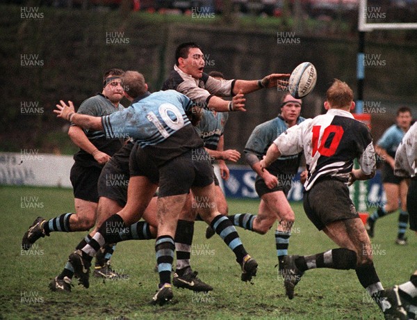 070195 - Newbridge v Pontypridd - Dale McIntosh of Pontypridd is tackled by Phil Withers of Newbridge