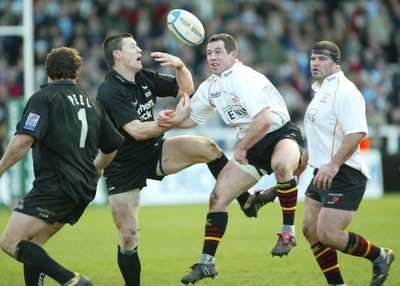 160105 - Newcastle Falcons v Newport Gwent Dragons - Heineken Cup Rugby - Dragons Gareth Cooper challenges Matt Burke for the ball