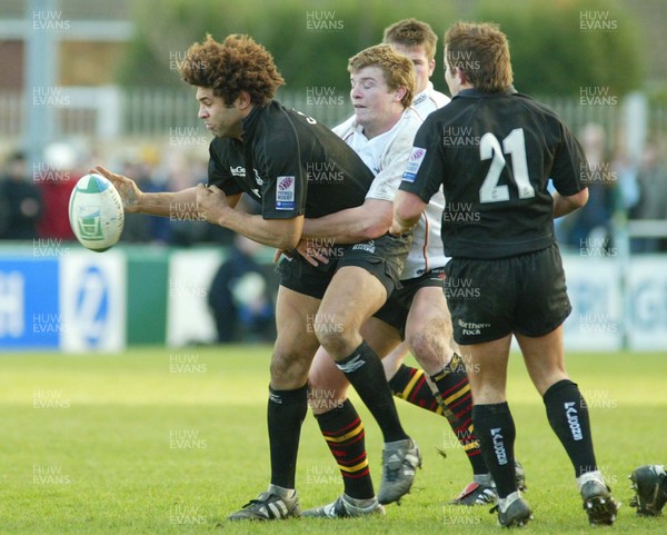 160105 - Newcastle Falcons v Newport Gwent Dragons - Heineken Cup Rugby - Falcons Colin Charvis is held by Rhys Oakley