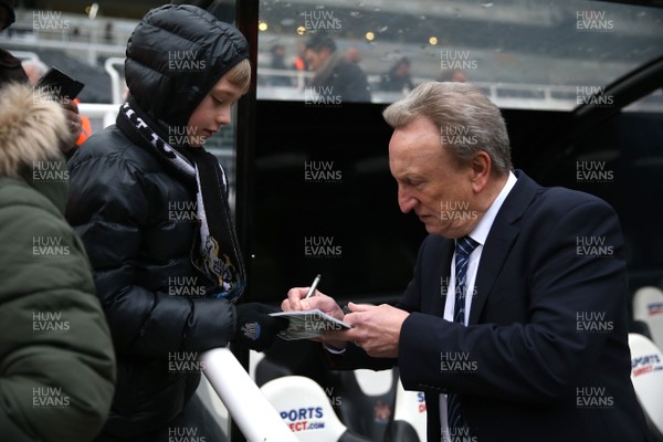 190119 - Newcastle United v Cardiff City - Premier League - The Cardiff City manager Neil Warnock signs an autograph