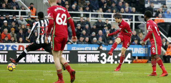 130118 - Newcastle United v Swansea City - Premier League -  Ki Sung Yueng (2nd r) of Swansea City shooting