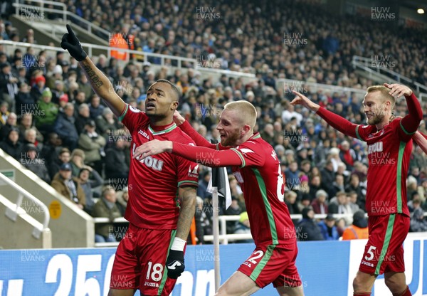 130118 - Newcastle United v Swansea City - Premier League -  Jordan Ayew (18) of Swansea City celebrates scoring the opening goal
