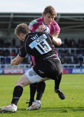 11.04.10 - Newcastle Falcons v Cardiff Blues - Amlin Challenge Cup Quarter Final - Ben Blair of Cardiff Blues is tackled by Alex Tait of Newcastle Falcons. 