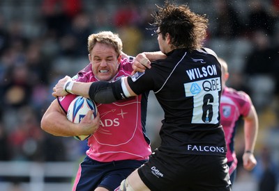 11.04.10 - Newcastle Falcons v Cardiff Blues - Amlin Challenge Cup Quarter Final - Xavier Rush of Cardiff Blues is tackled by Brent Wilson of Newcastle Falcons. 