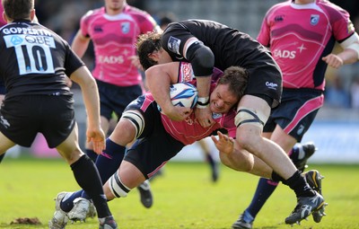 11.04.10 - Newcastle Falcons v Cardiff Blues - Amlin Challenge Cup Quarter Final - Xavier Rush of Cardiff Blues is tackled by Brent Wilson of Newcastle Falcons. 