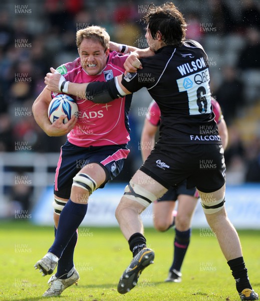 11.04.10 - Newcastle Falcons v Cardiff Blues - Amlin Challenge Cup Quarter Final - Xavier Rush of Cardiff Blues is tackled by Brent Wilson of Newcastle Falcons. 