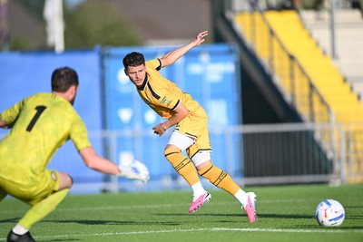 080726 - Newport City v Newport County - Pre Season Friendly - Kieron Evans of Newport County plays a cross into the box