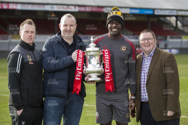 250118 - Newport County - FA Cup preview - Newport County Manager Michael Flynn, poet Sean Edwards, player Frank Nouble and Chairman Gavin Foxall with the trophy