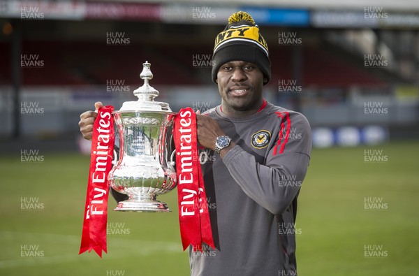 250118 - Newport County - FA Cup preview - Newport County player Frank Nouble with the trophy